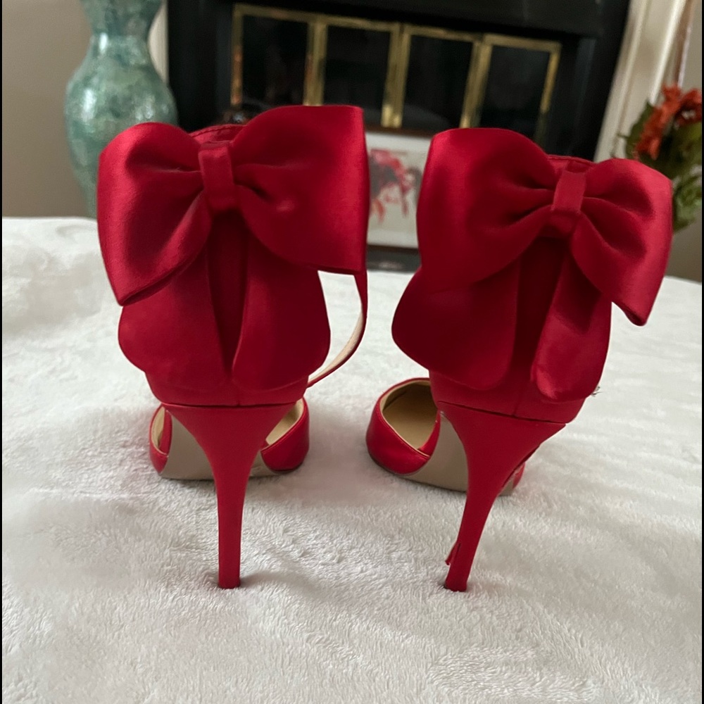 Jessica Simpson red bow heels. Worn once only. No pets no smoking. 6.5